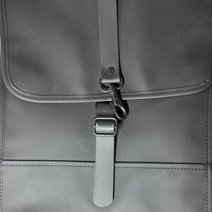 Rains waterproof  black backpack.